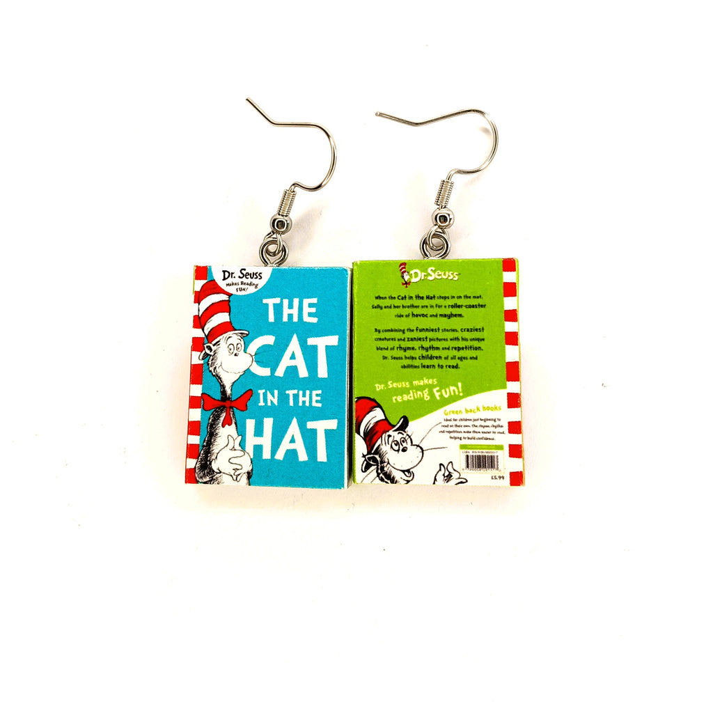 A pair of dangling earrings shaped like book covers from Dr. Seuss's 'The Cat in the Hat', shown against a plain white background.
