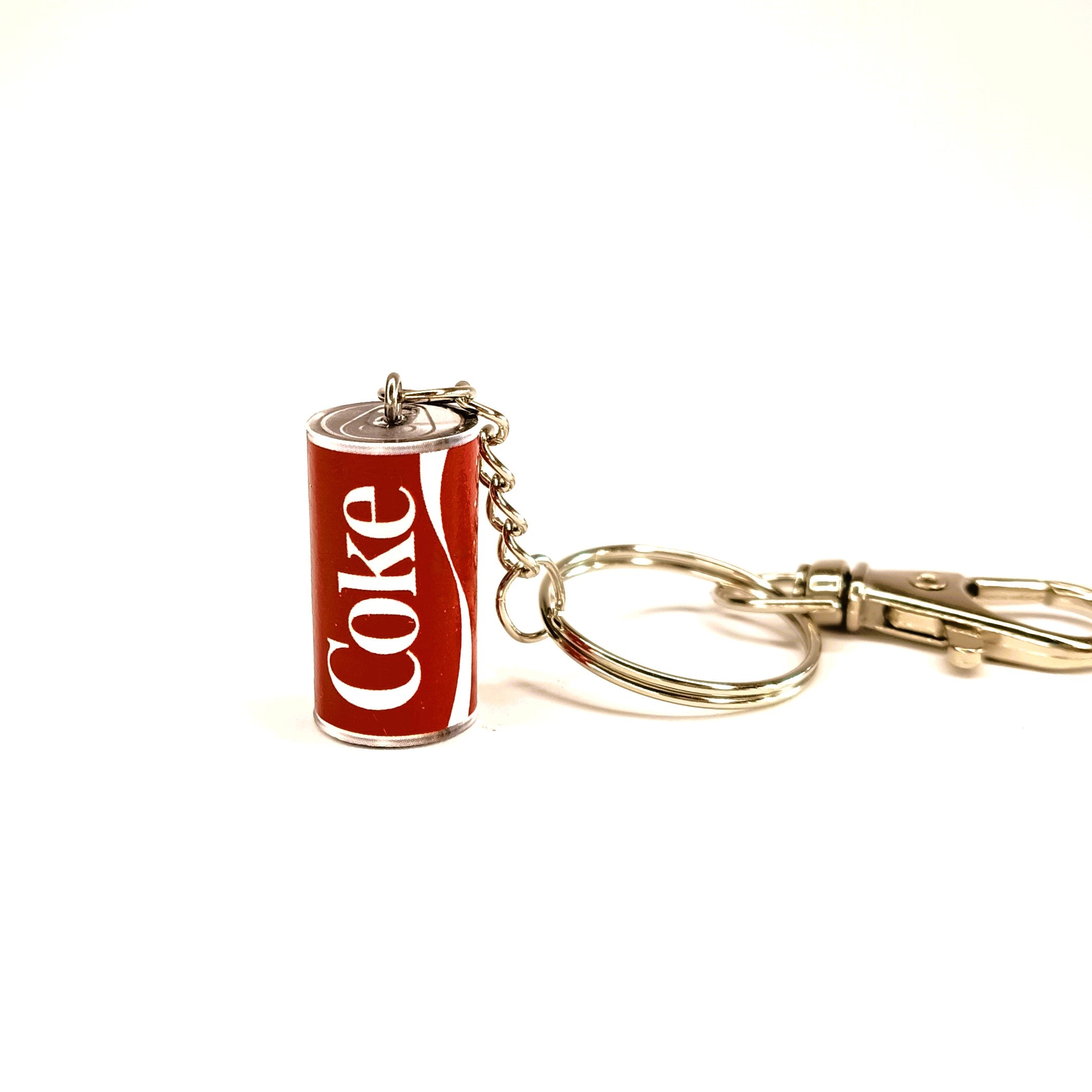 Classic red miniature Coke can with silver toned keyring and lobster clasp attached