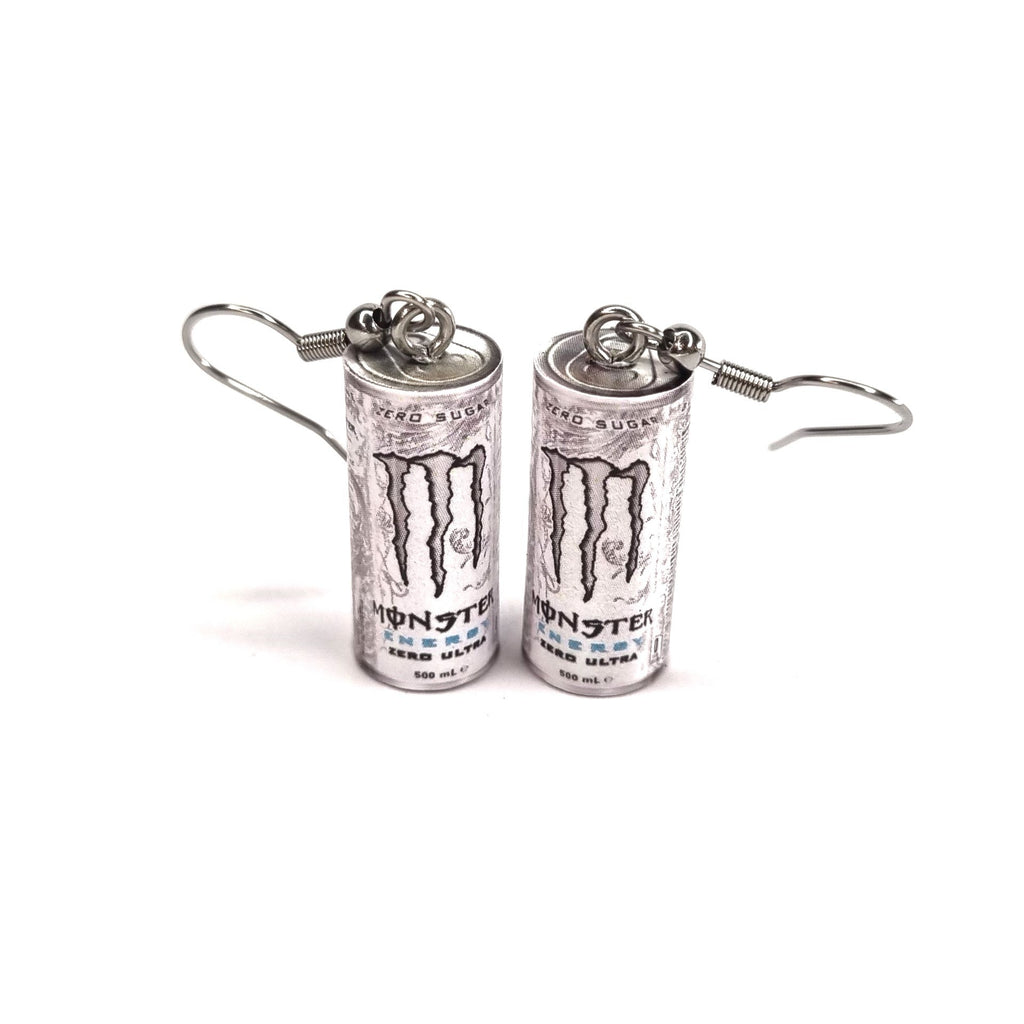 Monster energy drink can earrings on a white background