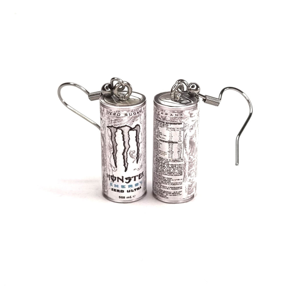 Monster energy drink can earrings on a white background