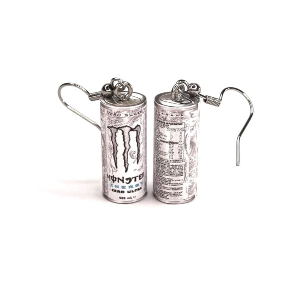 Monster energy drink can earrings on a white background
