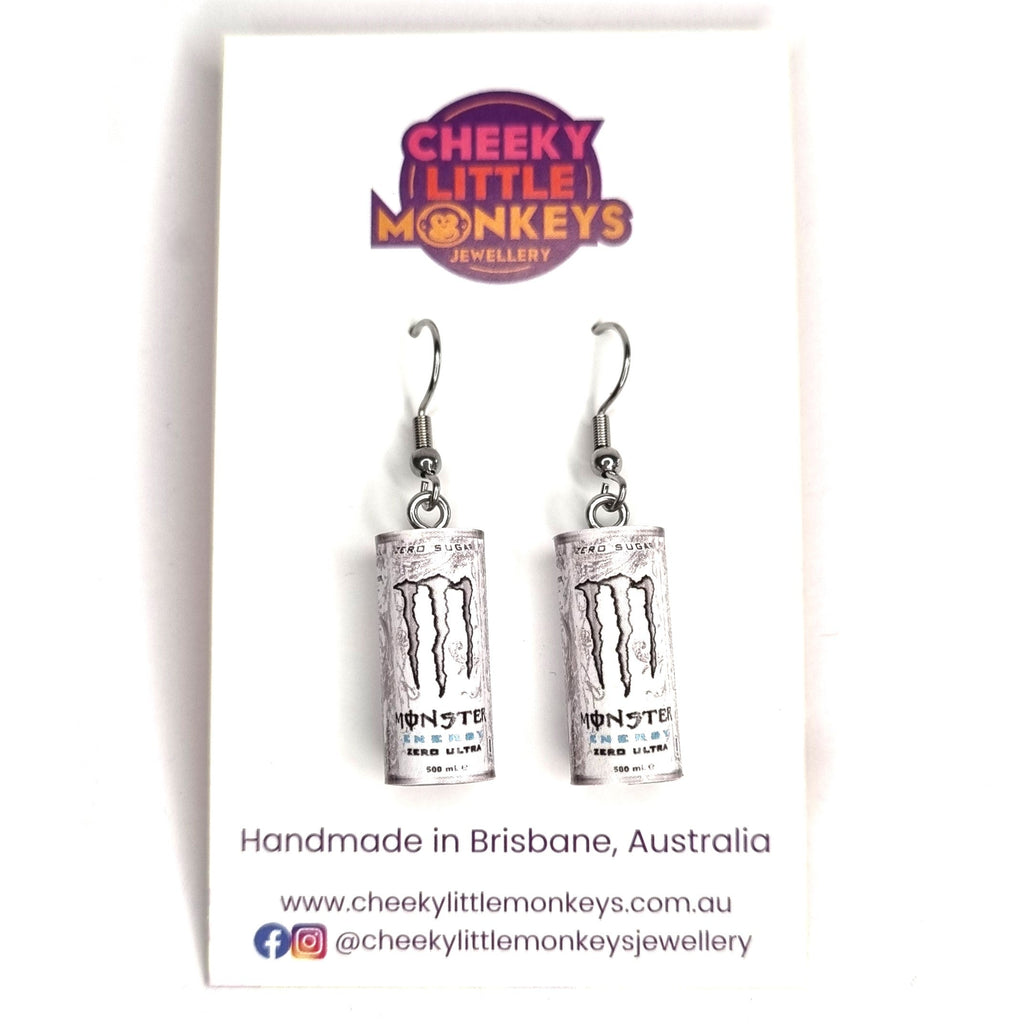 Monster energy drink can-shaped earrings on a Cheeky Little Monkeys branded card.