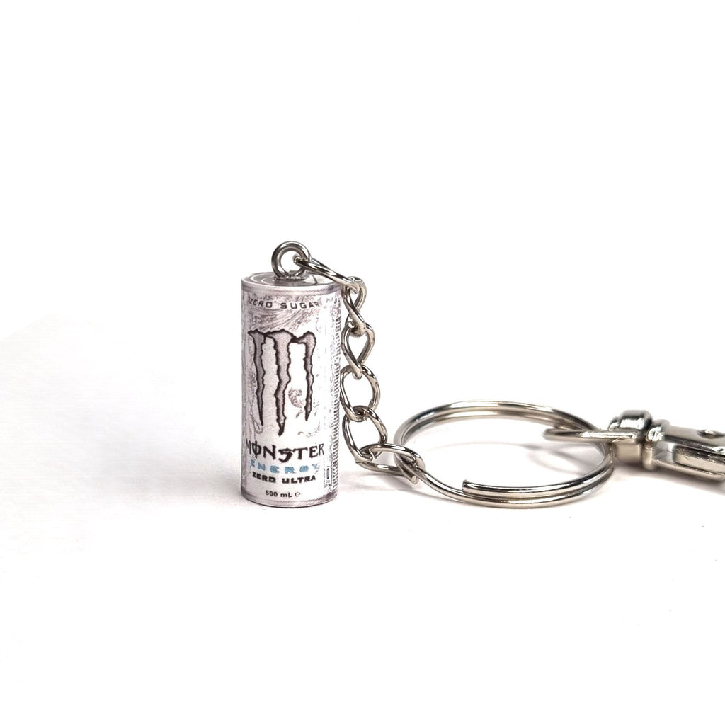 Keychain shaped like a Monster Energy drink can on a white background
