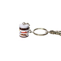 A miniature keychain shaped like a Nutella jar, featuring a brown and white label with the Nutella logo, attached to a silver metal split ring and clasp on a plain white background.