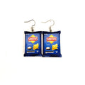 A pair of novelty earrings shaped like miniature blue bags of Smith's Original potato chips, complete with silver fishhook ear wires, shown on a plain white background.