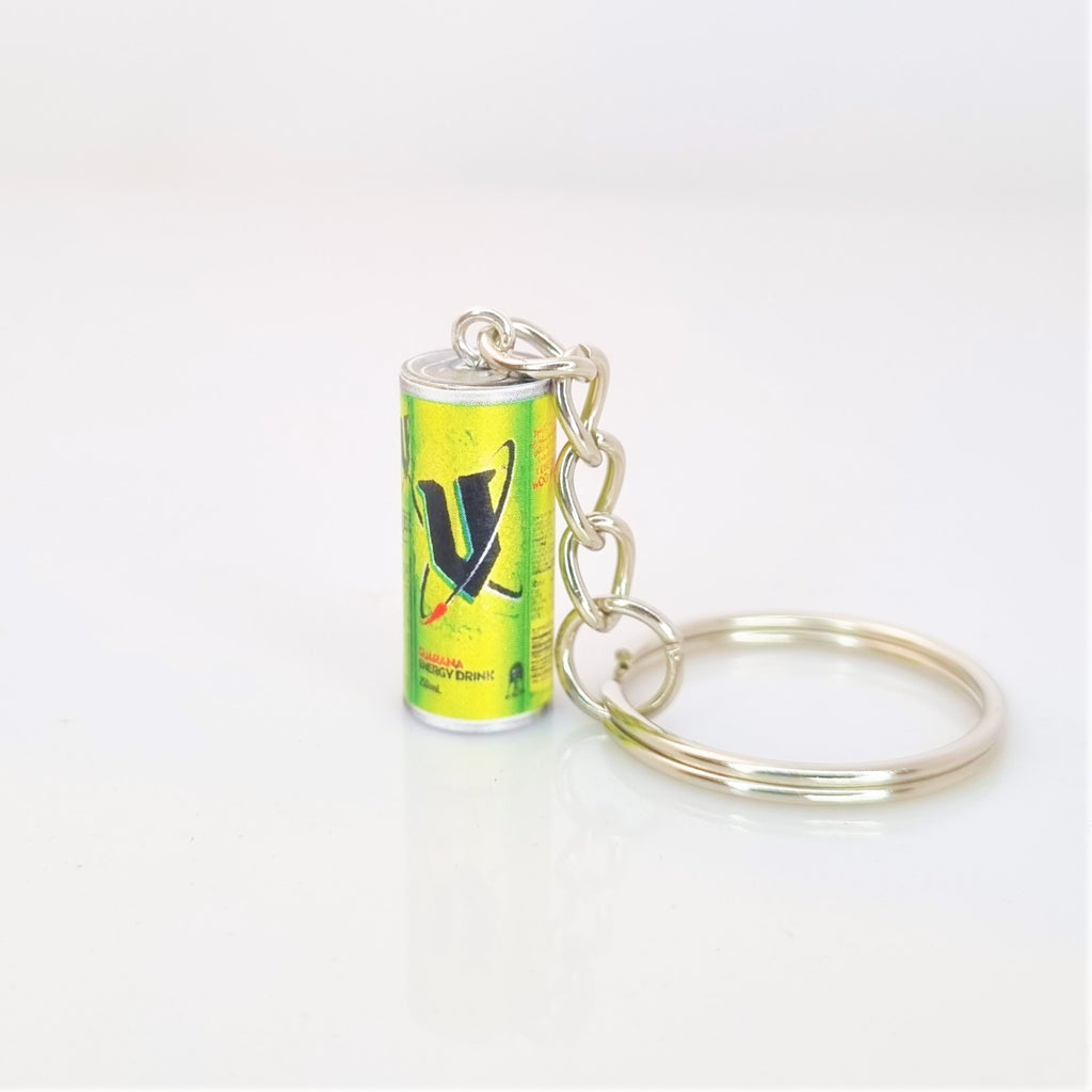 Miniature V energy drink keyring against a white background